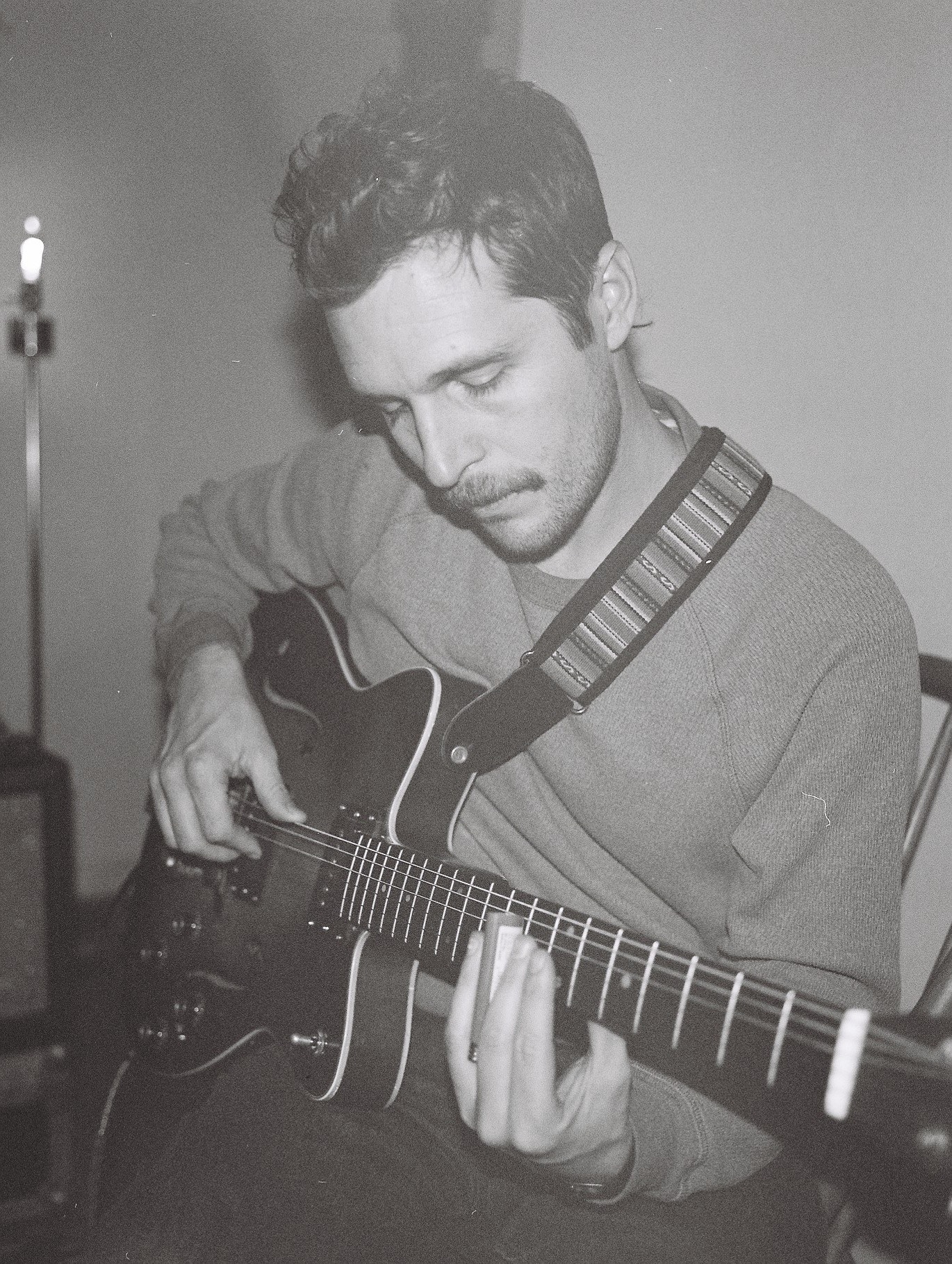 Joseph Teller playing guitar